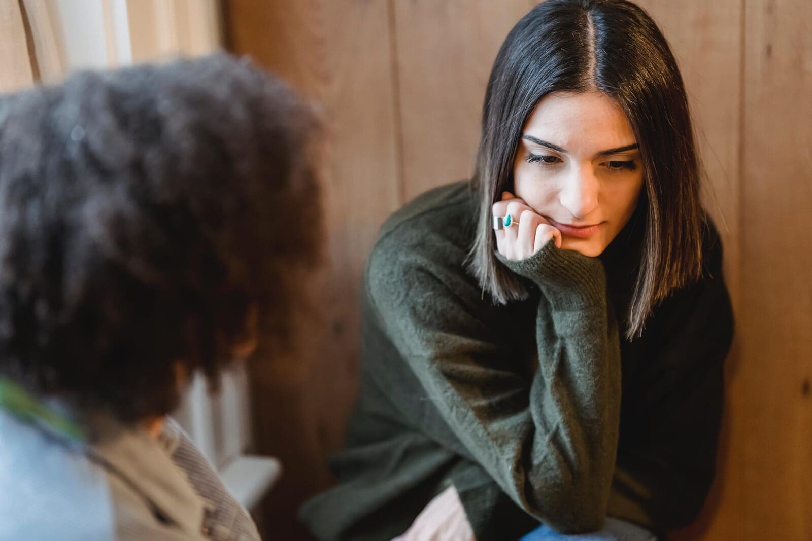 two women in deep conversation