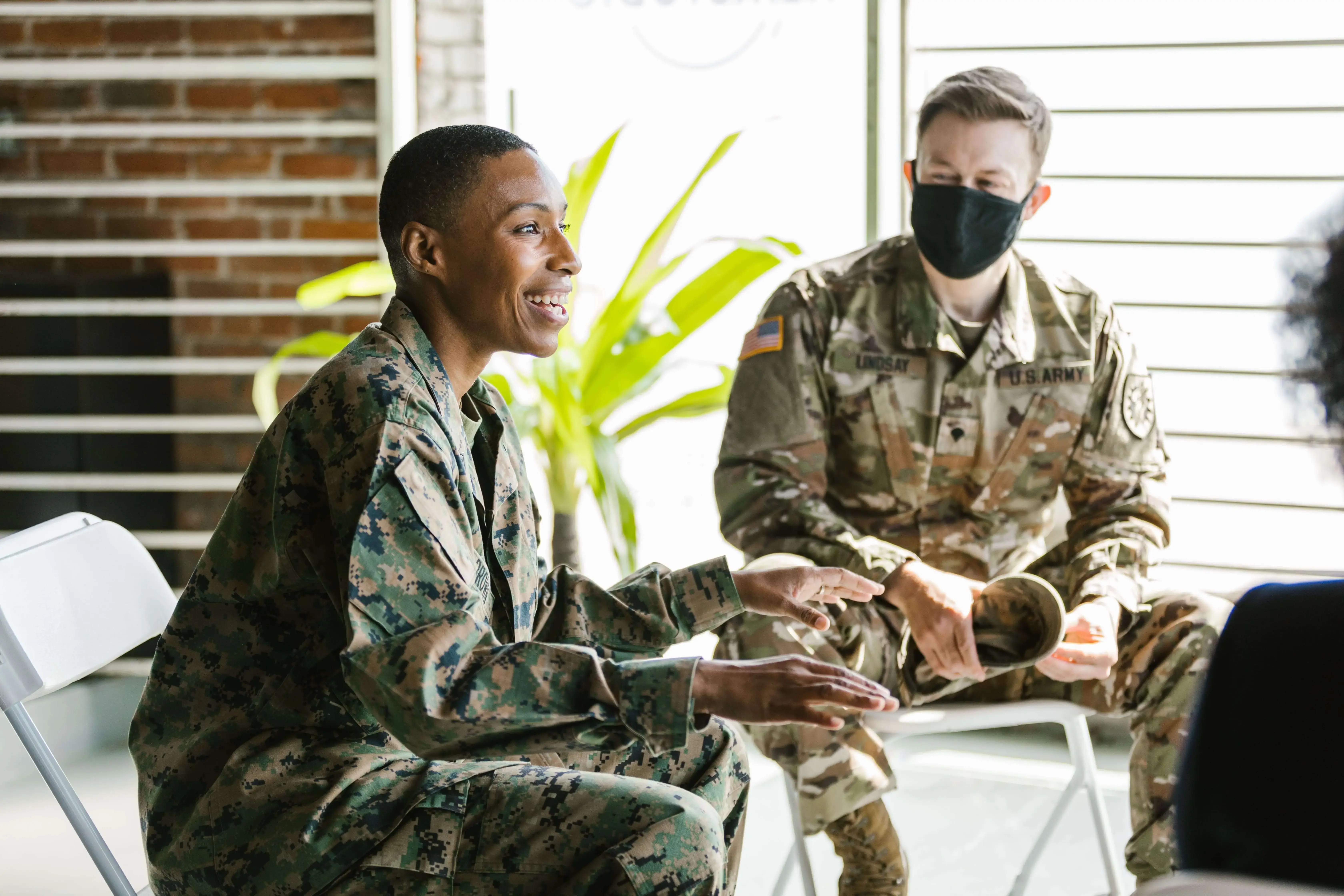 group of military members talking